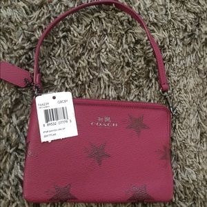 Brand new COACH wristlet